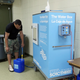 Terun Moore fills a reusable jug with filtered water on March 24, 2022, in Jackson, Mississippi. Every morning, 180 students at a school in Jackson, Mississippi had to board a bus to be taken to another nearby school, because their school lacked the water pressure needed to flush its own toilets.